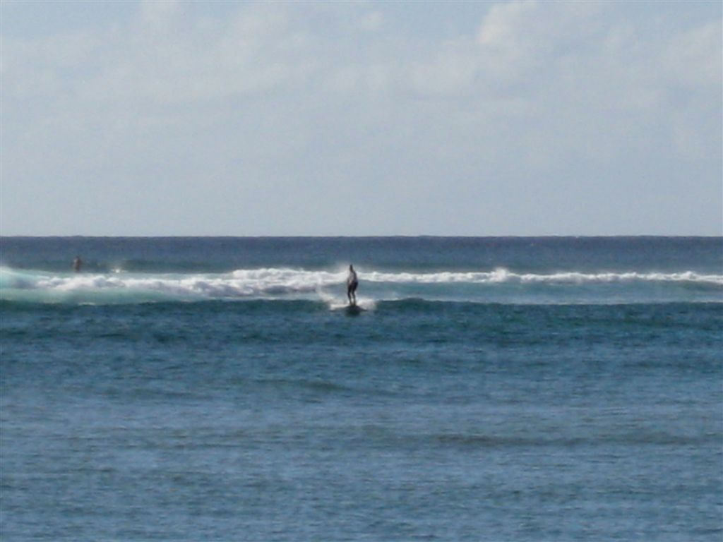 Surfer in Hanalei Bay