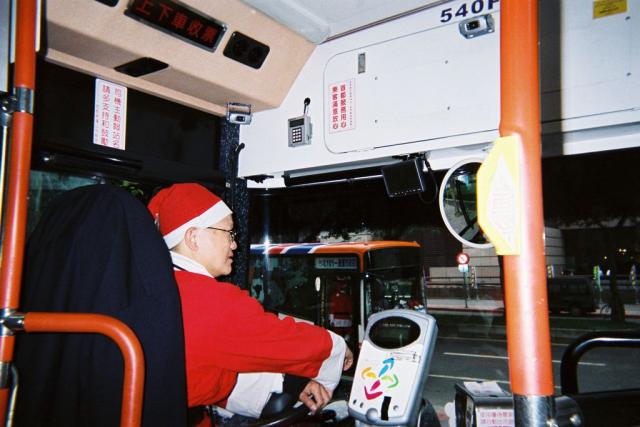 Santas driving the Taipei 101 shuttles