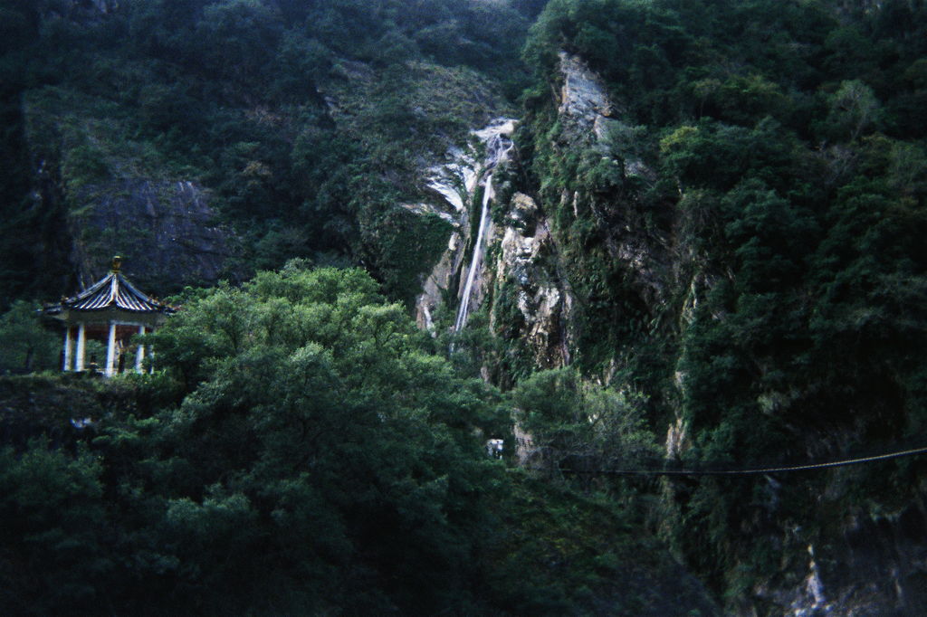 Waterfall and suspension bridge near our campsite