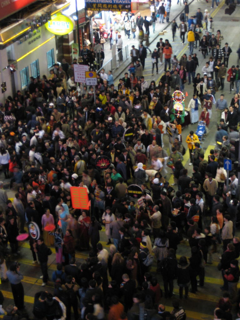 A mini parade in the middle of the crowd