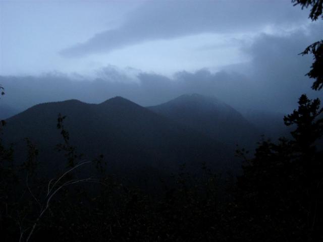 Darkness falls across the mountains
