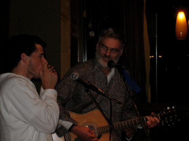 New and old.  Young playing harmonica! :)