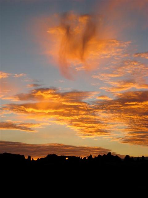 Awesome pre-sunrise clouds and arches