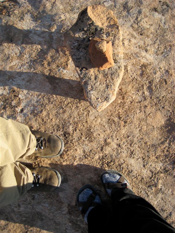 Our feet with the inukshuk