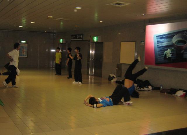 Practicing breakdancing in the mall!