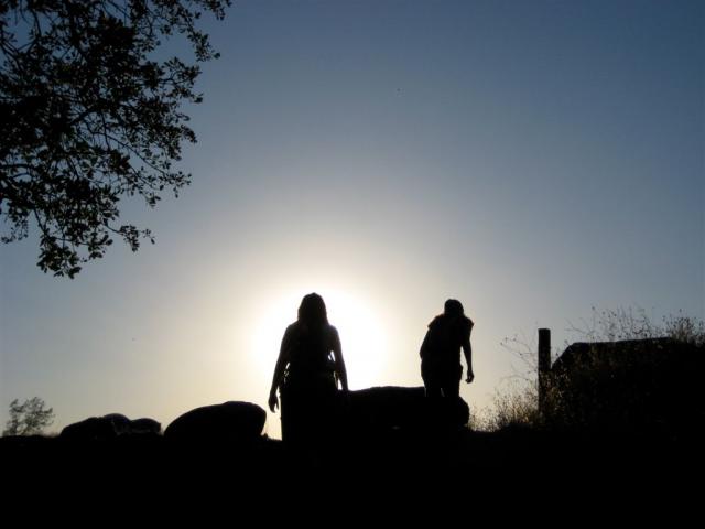 Silhouettes exiting Bear Hole