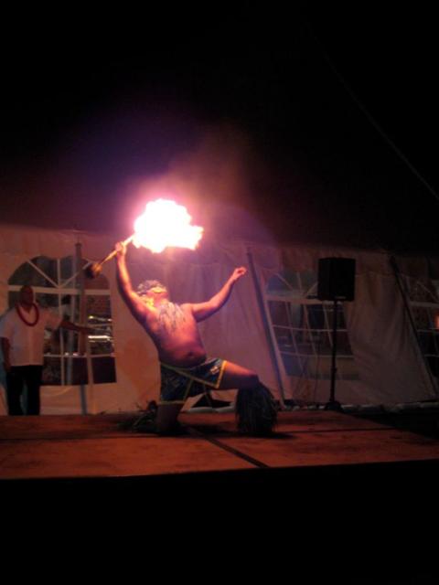 The fire dancer had to be viewed outside of the tent